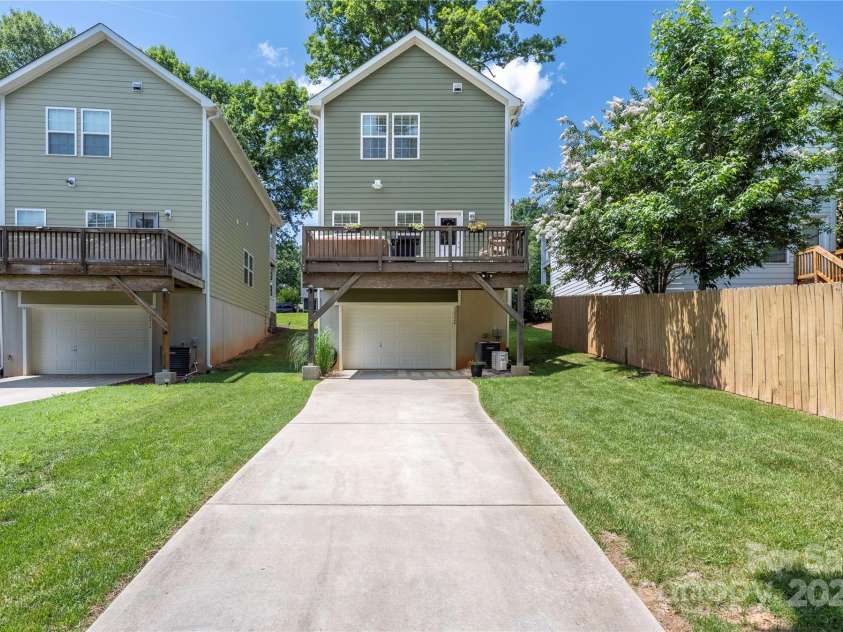 12220 Huntersville Concord Road, Huntersville, NC 28078.  MLS# CAR4265142, YatesRealty ID 23109. Rear View with extended driveway