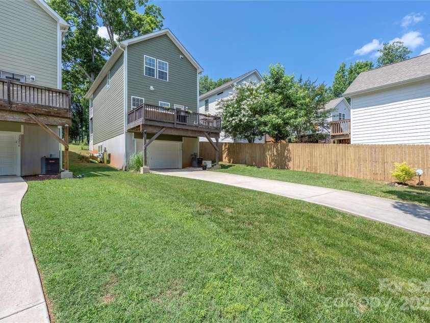 12220 Huntersville Concord Road, Huntersville, NC 28078.  MLS# CAR4265142, YatesRealty ID 23109. Rear View with extended driveway