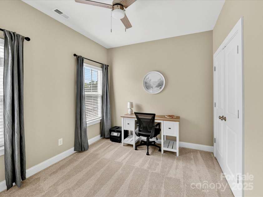 12220 Huntersville Concord Road, Huntersville, NC 28078.  MLS# CAR4301471, YatesRealty ID 23109. Main level Bedroom #1 or Flex space for an Office. New plush carpet, double door closet space, tons of light and ceiling fan