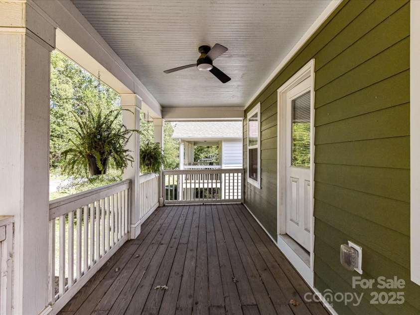 12220 Huntersville Concord Road, Huntersville, NC 28078.  MLS# CAR4301471, YatesRealty ID 23109. Private Balcony off of the Primary Bedroom with outdoor ceiling fans and light