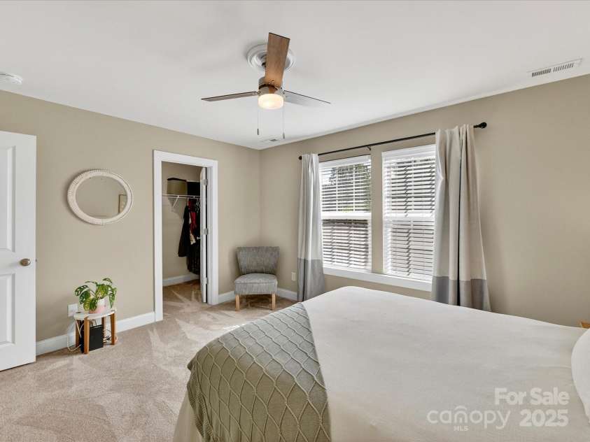 12220 Huntersville Concord Road, Huntersville, NC 28078.  MLS# CAR4301471, YatesRealty ID 23109. Upstairs Bedroom #2 with tons of natural light , new carpet, closet and ceiling fan with light