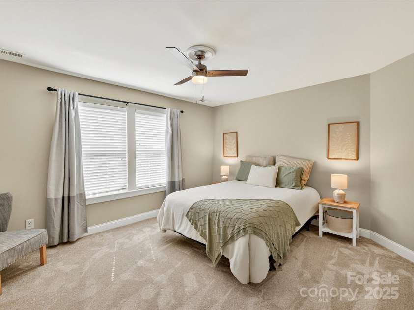 12220 Huntersville Concord Road, Huntersville, NC 28078.  MLS# CAR4301471, YatesRealty ID 23109. Upstairs Bedroom #2 with tons of natural light , new carpet, closet and ceiling fan with light