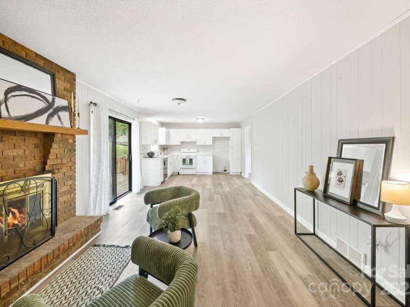 16 Sun Valley Court, Alexander, NC 28701.  MLS# CAR4263633, YatesRealty ID 23110. Den kitchen open space