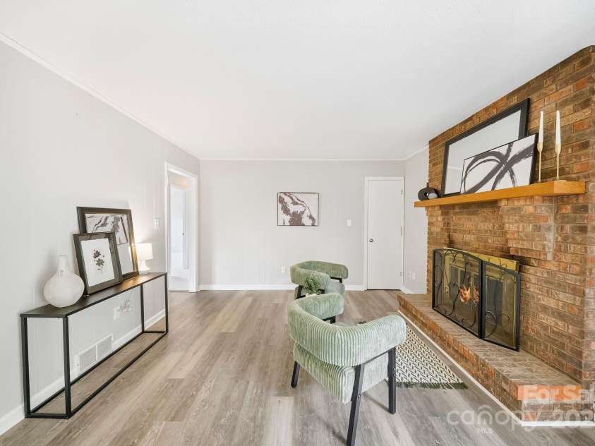 16 Sun Valley Court, Alexander, NC 28701.  MLS# CAR4263633, YatesRealty ID 23110. Den leading to hallway