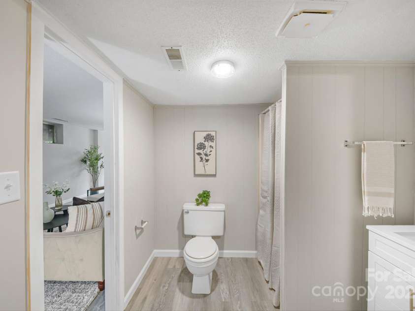 16 Sun Valley Court, Alexander, NC 28701.  MLS# CAR4263633, YatesRealty ID 23110. Full bath downstairs