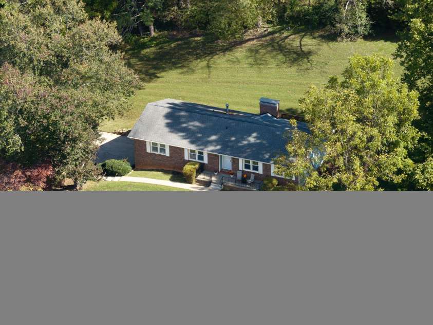 16 Sun Valley Court, Alexander, NC 28701.  MLS# CAR4263633, YatesRealty ID 23110. Large front and back yard