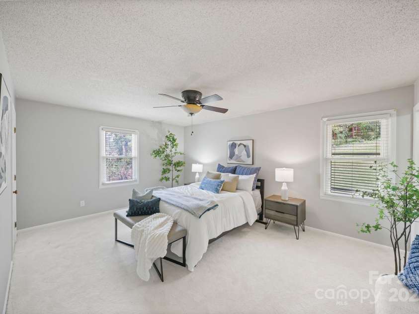 16 Sun Valley Court, Alexander, NC 28701.  MLS# CAR4263633, YatesRealty ID 23110. Primary bedroom