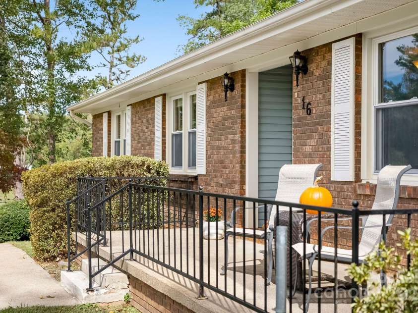 16 Sun Valley Court, Alexander, NC 28701.  MLS# CAR4263633, YatesRealty ID 23110. Welcoming front porch for sipping coffee