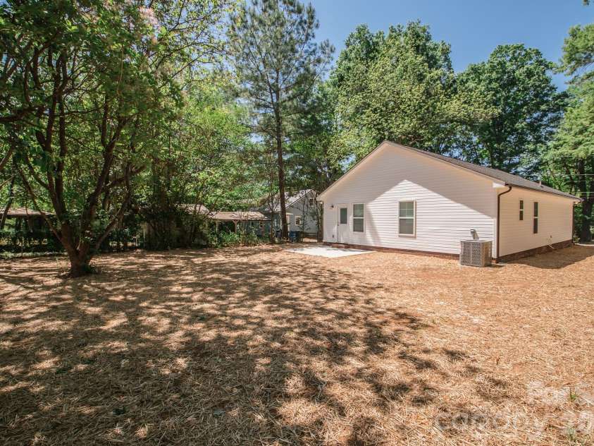 415 Jackson Street, Albemarle, NC 28001.  MLS# CAR4373476, YatesRealty ID 23110. Backyard