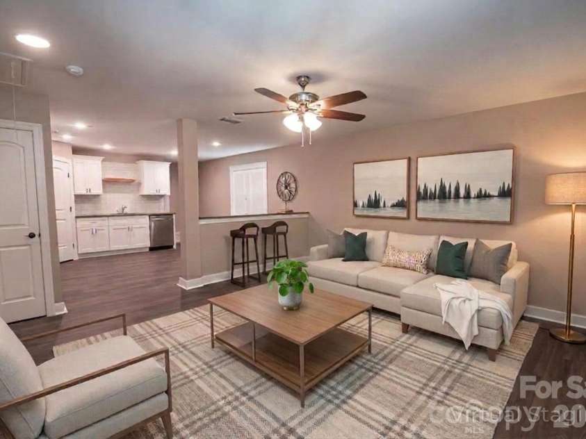 415 Jackson Street, Albemarle, NC 28001.  MLS# CAR4373476, YatesRealty ID 23110. Living room