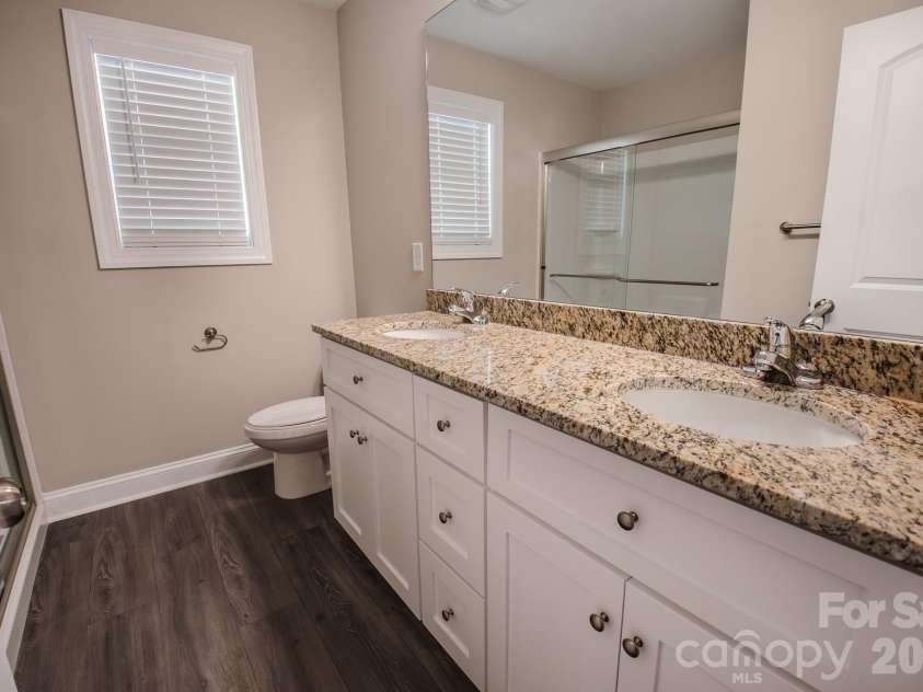 415 Jackson Street, Albemarle, NC 28001.  MLS# CAR4373476, YatesRealty ID 23110. Primary bathroom