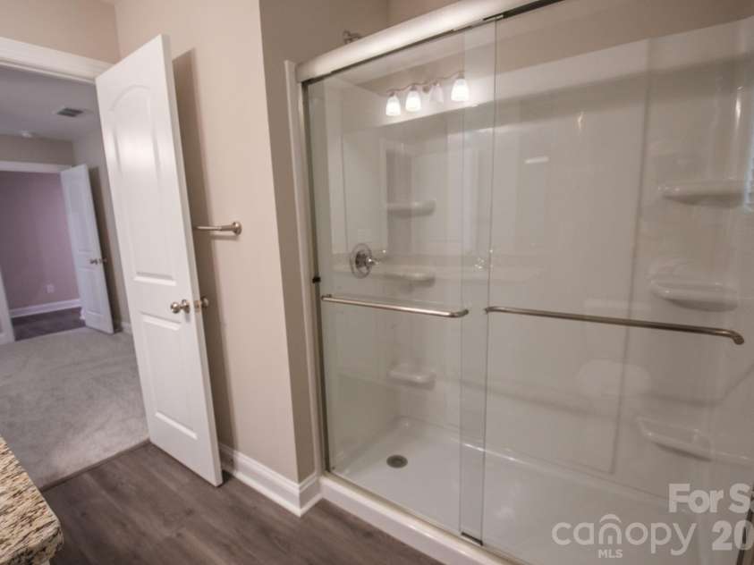 415 Jackson Street, Albemarle, NC 28001.  MLS# CAR4373476, YatesRealty ID 23110. Primary bathroom