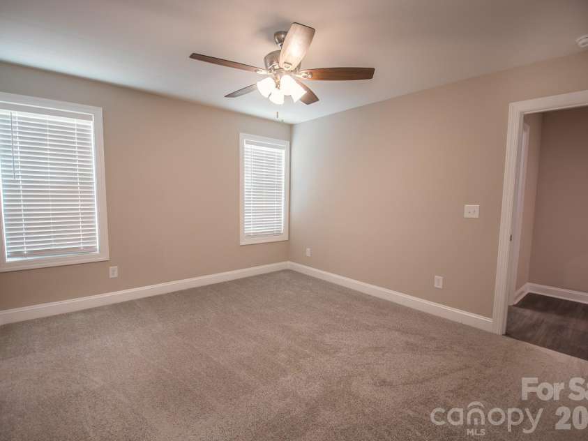 415 Jackson Street, Albemarle, NC 28001.  MLS# CAR4373476, YatesRealty ID 23110. Primary bedroom