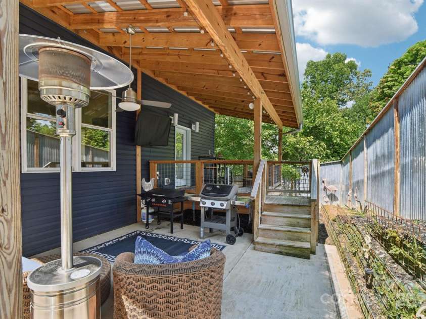 84 West Street, Weaverville, NC 28787.  MLS# CAR4272647, YatesRealty ID 23114. Cozy Covered Back Porch