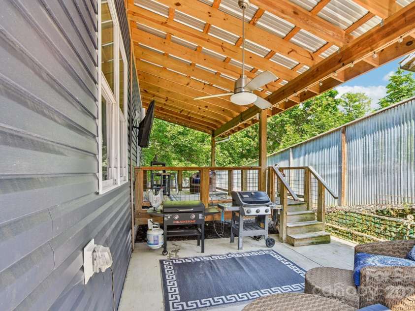 84 West Street, Weaverville, NC 28787.  MLS# CAR4272647, YatesRealty ID 23114. Enjoy Grilling, Dining, or Lounging