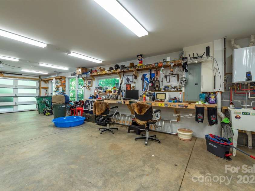84 West Street, Weaverville, NC 28787.  MLS# CAR4272647, YatesRealty ID 23114. Massive Garage and Workshop