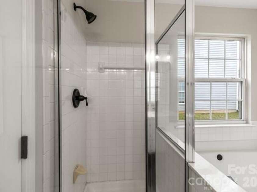 11619 Planters Estates Drive, Charlotte, NC 28278.  MLS# CAR4423181, YatesRealty ID 23116. Separate shower in Primary bath