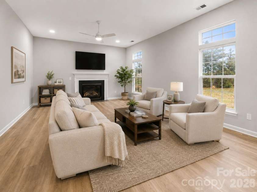 11619 Planters Estates Drive, Charlotte, NC 28278.  MLS# CAR4423181, YatesRealty ID 23116. Virtually staged family room