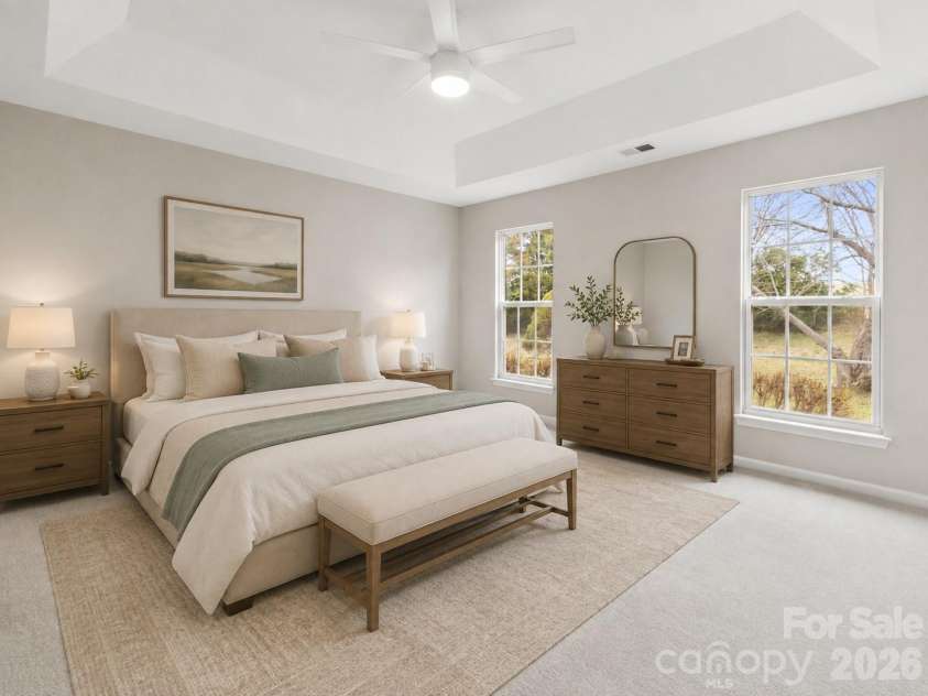 11619 Planters Estates Drive, Charlotte, NC 28278.  MLS# CAR4423181, YatesRealty ID 23116. Virtually staged Primary bedroom, with trey ceiling, new carpet and ceiling fan