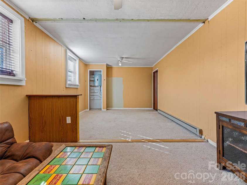 204 Sutton Avenue, Black Mountain, NC 28711.  MLS# CAR4331519, YatesRealty ID 2312. Front upper loft