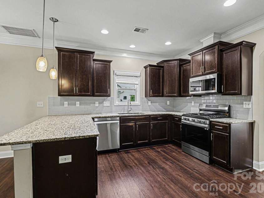 3042 Collin House Drive, Fort Mill, SC 29715.  MLS# CAR4372981, YatesRealty ID 23121. Kitchen 3