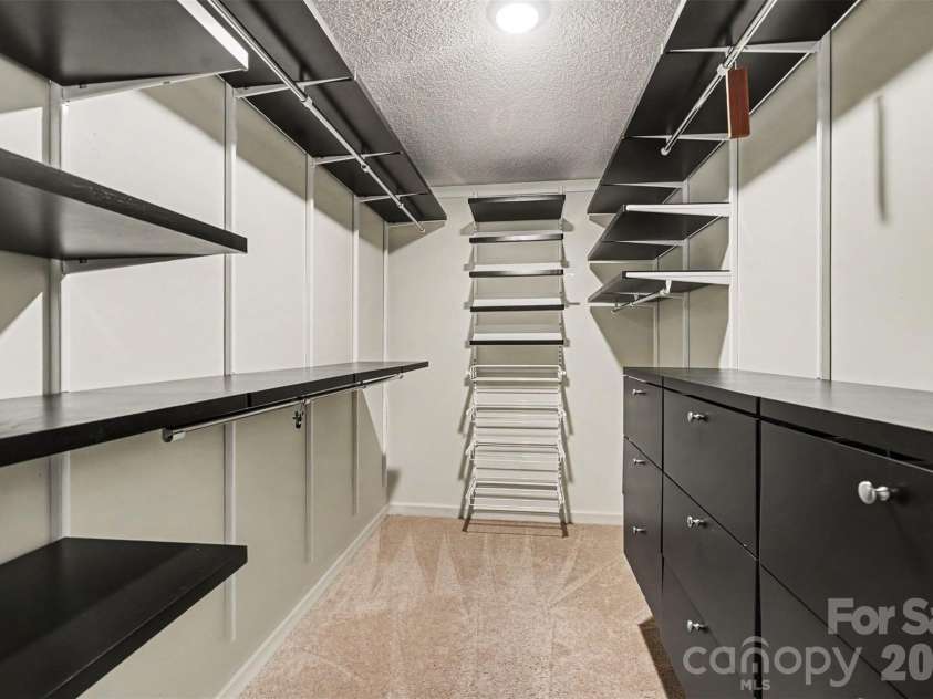 7928 Covey Chase Drive, Charlotte, NC 28210.  MLS# CAR4371699, YatesRealty ID 23122. Custom primary closet