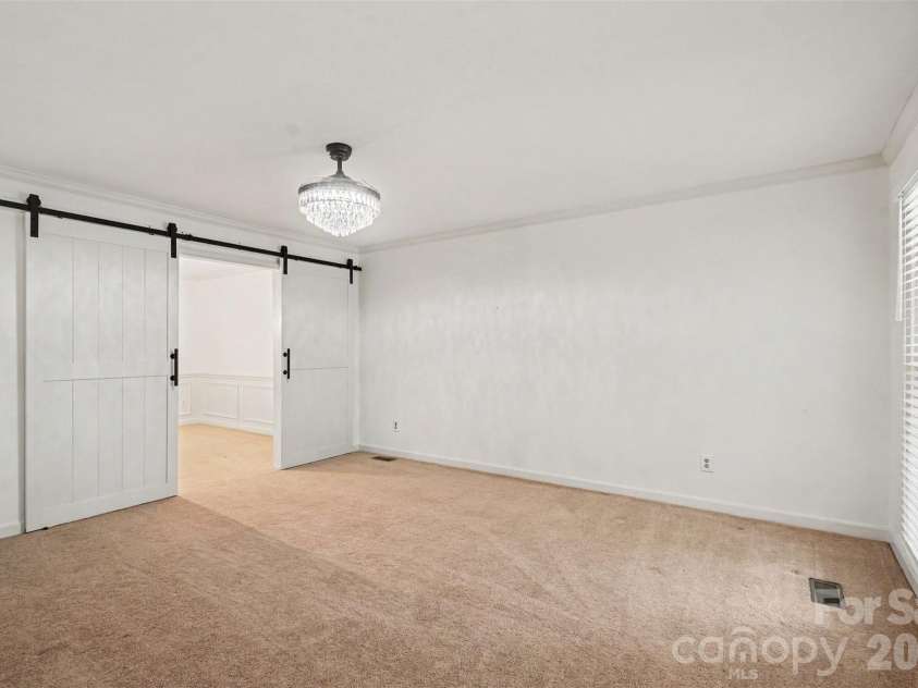 7928 Covey Chase Drive, Charlotte, NC 28210.  MLS# CAR4371699, YatesRealty ID 23122. Second living room or study