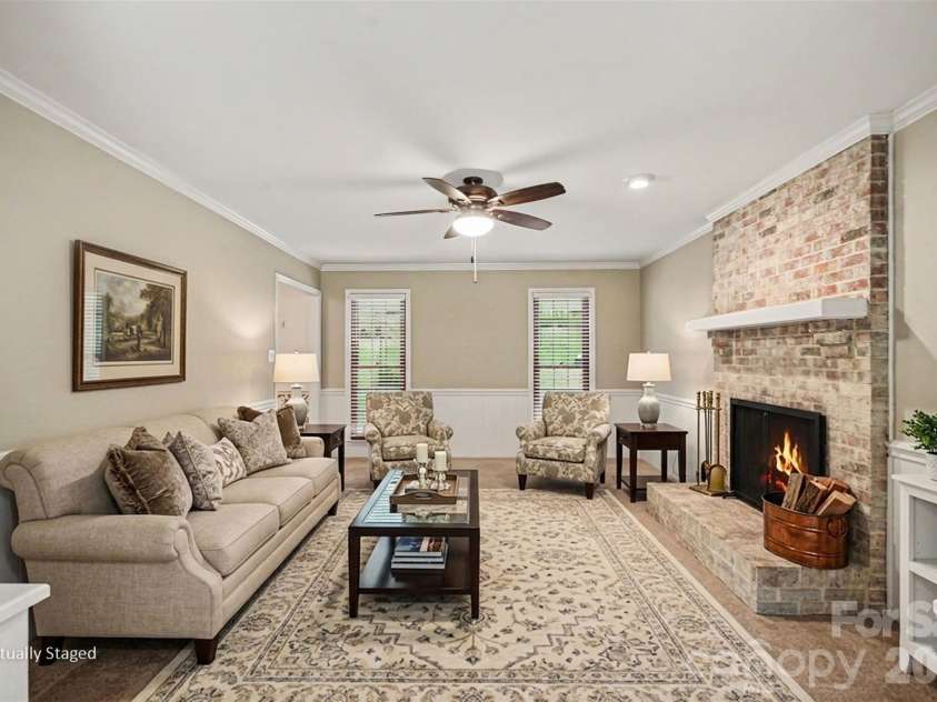 7928 Covey Chase Drive, Charlotte, NC 28210.  MLS# CAR4371699, YatesRealty ID 23122. Virtually staged living room