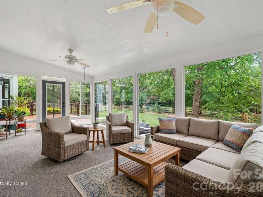 7928 Covey Chase Drive, Charlotte, NC 28210.  MLS# CAR4371699, YatesRealty ID 23122. Virtually staged sunroom