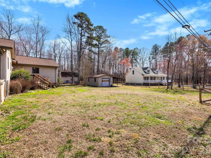 2010 Sprucewood Street, Albemarle, NC 28001.  MLS# CAR4354173, YatesRealty ID 23123. Back Yard