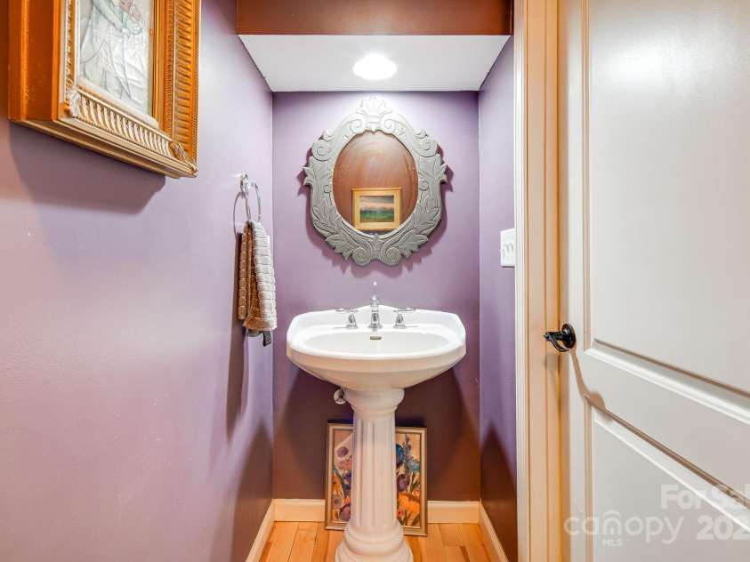 25 Frannys Farm Road, Leicester, NC 28748.  MLS# CAR4269407, YatesRealty ID 23129. Main level half bath