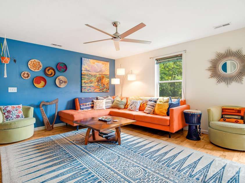 25 Frannys Farm Road, Leicester, NC 28748.  MLS# CAR4269407, YatesRealty ID 23129. Main level living room