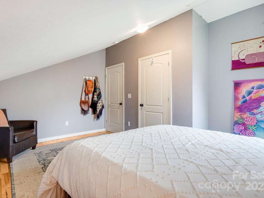 25 Frannys Farm Road, Leicester, NC 28748.  MLS# CAR4269407, YatesRealty ID 23129. Upper level bedroom 1