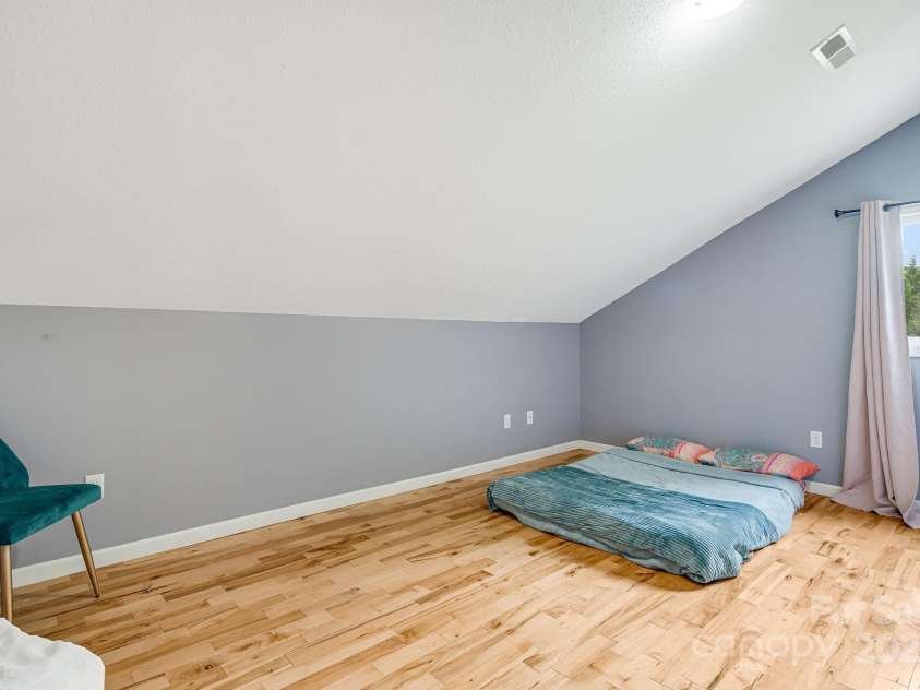 25 Frannys Farm Road, Leicester, NC 28748.  MLS# CAR4269407, YatesRealty ID 23129. Upper level bedroom 2