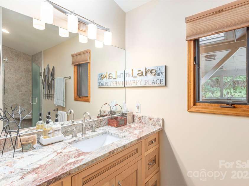 324 Cheulah Road, Brevard, NC 28712.  MLS# CAR4272420, YatesRealty ID 23130. Primary bathroom