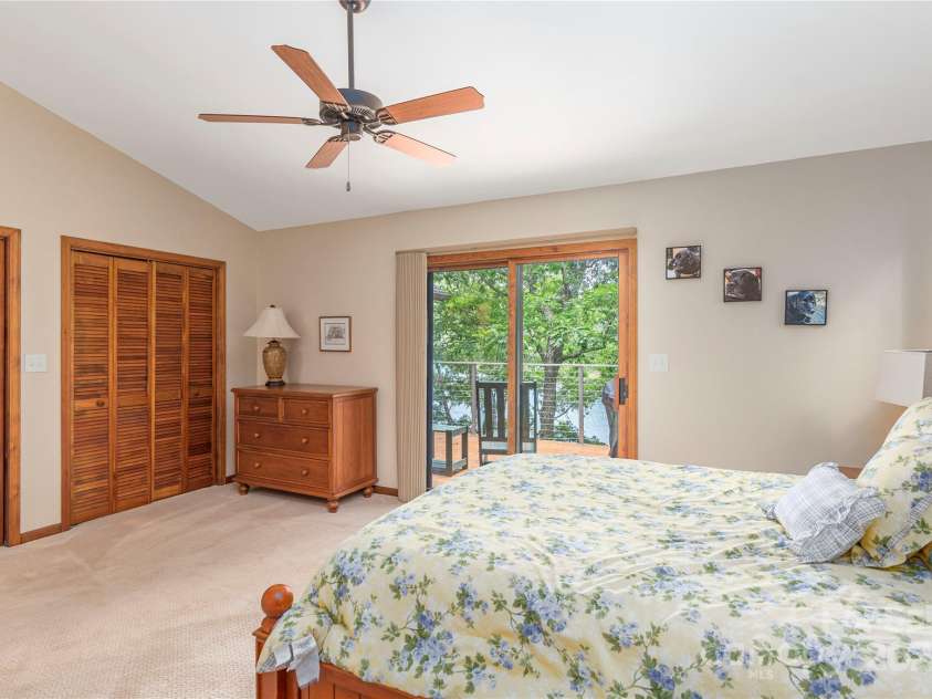 324 Cheulah Road, Brevard, NC 28712.  MLS# CAR4272420, YatesRealty ID 23130. Primary bedroom main level w/ walkout porch