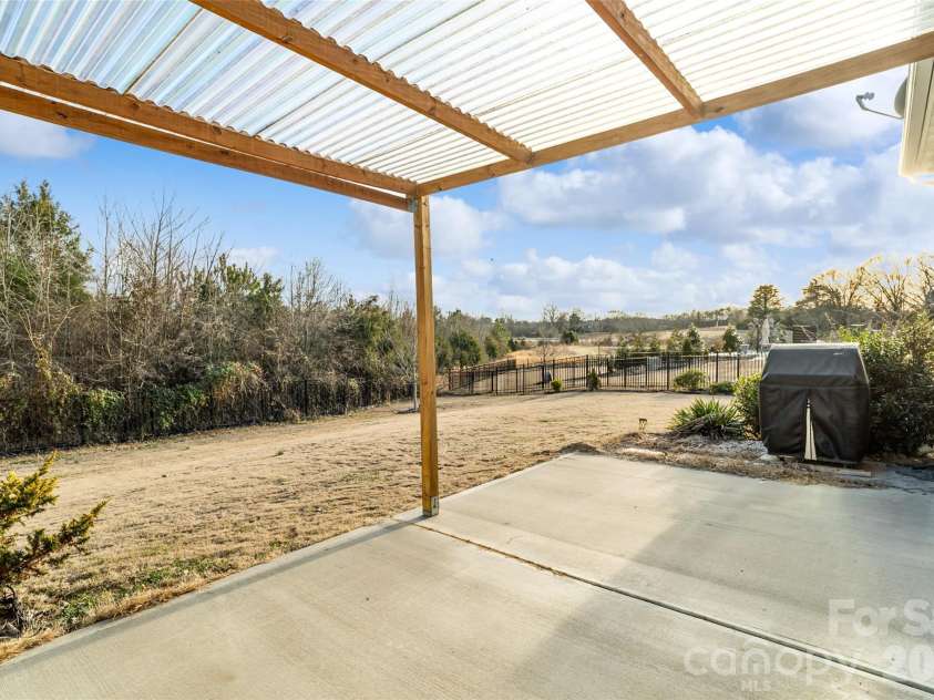 4211 Maggie Springs Way, Clover, SC 29710.  MLS# CAR4341092, YatesRealty ID 23131. Covered Patio