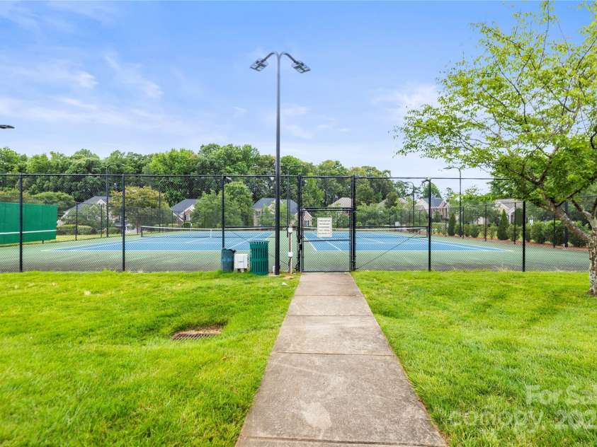 128 Sugar Thyme Lane, Mooresville, NC 28115.  MLS# CAR4266649, YatesRealty ID 23132. Community tennis courts