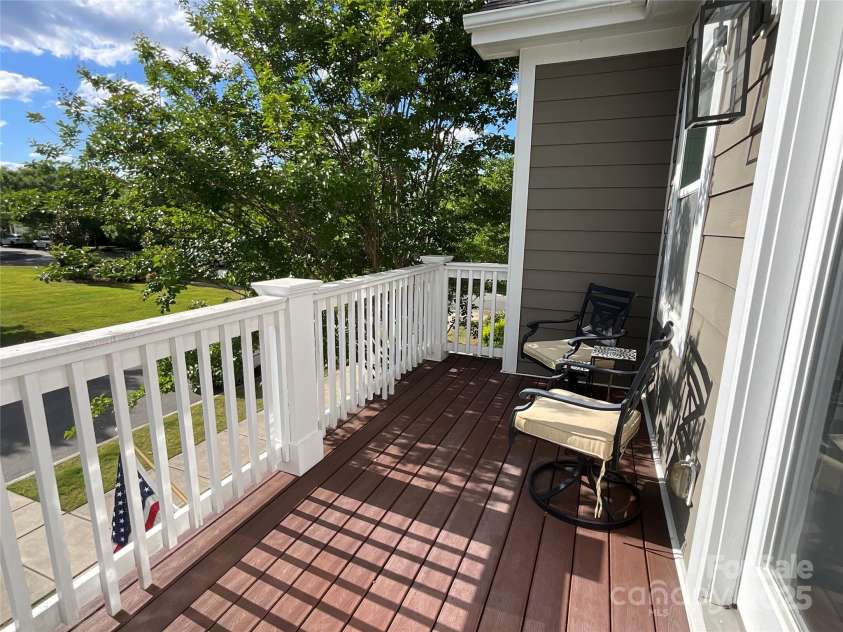 2007 Bishops Court, Cornelius, NC 28031.  MLS# CAR4257347, YatesRealty ID 23133. Balcony off of Secondary Bedroom