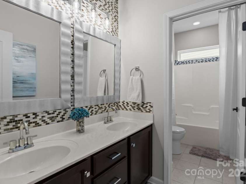 2007 Bishops Court, Cornelius, NC 28031.  MLS# CAR4257347, YatesRealty ID 23133. Hall Bathroom