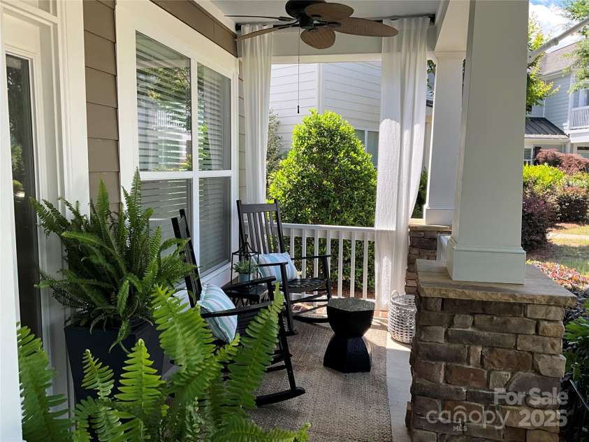 2007 Bishops Court, Cornelius, NC 28031.  MLS# CAR4257347, YatesRealty ID 23133. Inviting Front Porch overlooks community park area.