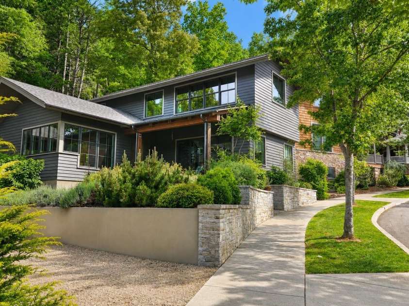 18 Wordsworth Road, Black Mountain, NC 28711.  MLS# CAR4377093, YatesRealty ID 23137. Property exterior, driveway corner perspective.