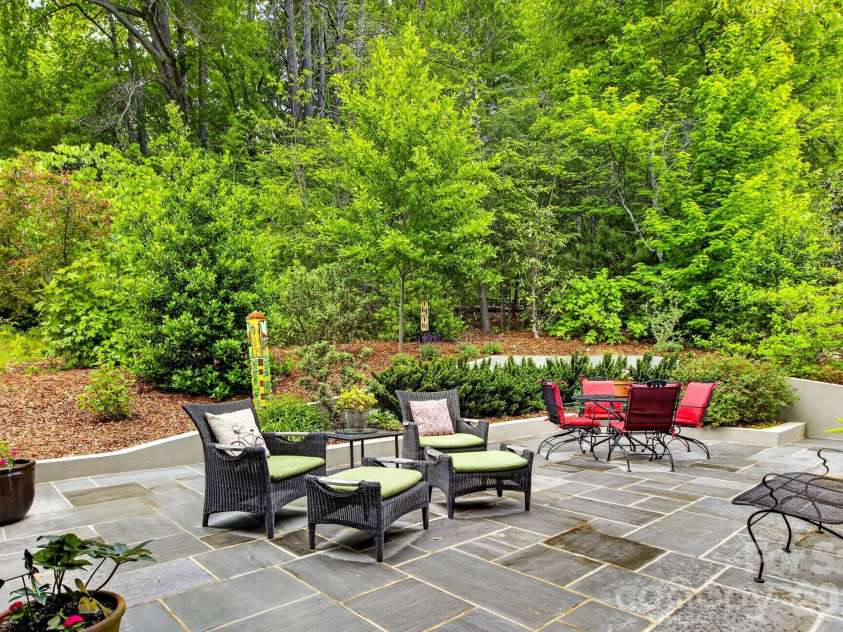 18 Wordsworth Road, Black Mountain, NC 28711.  MLS# CAR4377093, YatesRealty ID 23137. Serene and private back patio