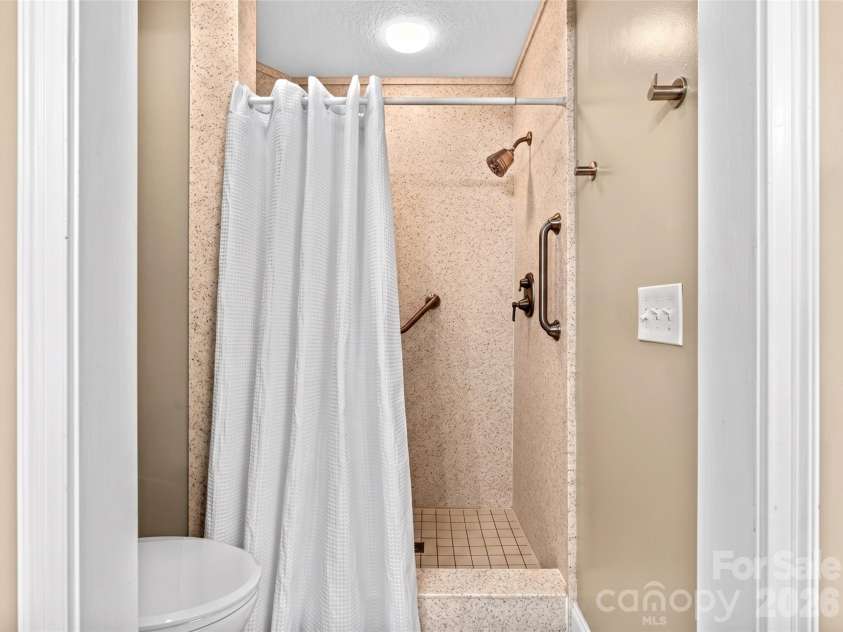60 Mountain Meadow Circle, Weaverville, NC 28787.  MLS# CAR4382244, YatesRealty ID 23140. Corian shower