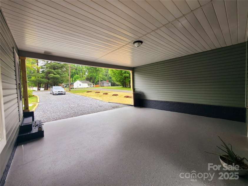 501 Hawthorne Street, Mount Holly, NC 28120.  MLS# CAR4250572, YatesRealty ID 23146. Double carport