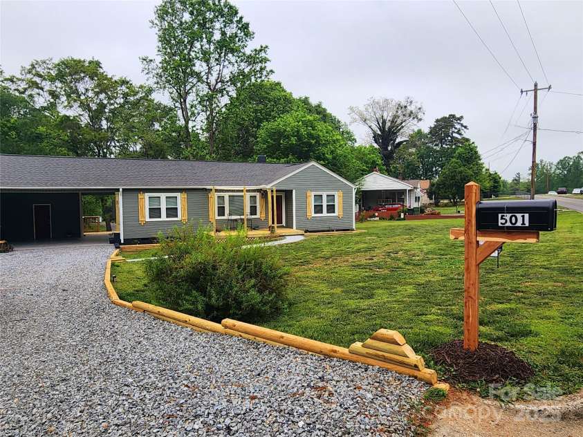 501 Hawthorne Street, Mount Holly, NC 28120.  MLS# CAR4250572, YatesRealty ID 23146. Gorgeous curb appeal