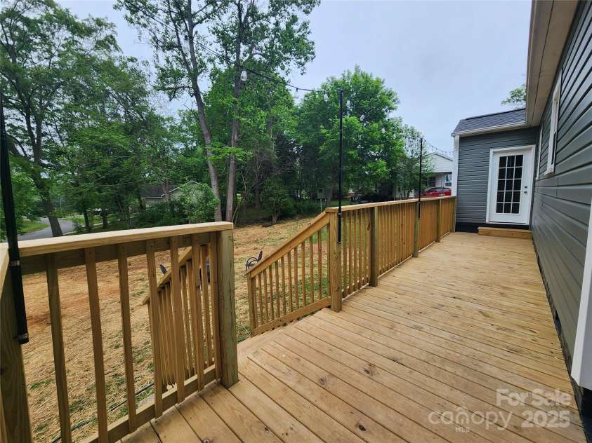 501 Hawthorne Street, Mount Holly, NC 28120.  MLS# CAR4250572, YatesRealty ID 23146. New decking