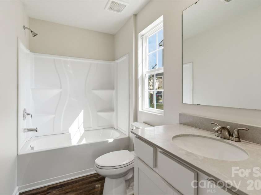 2801 Oldfield Drive, Monroe, NC 28110.  MLS# CAR4361095, YatesRealty ID 23147. First Floor Bathroom