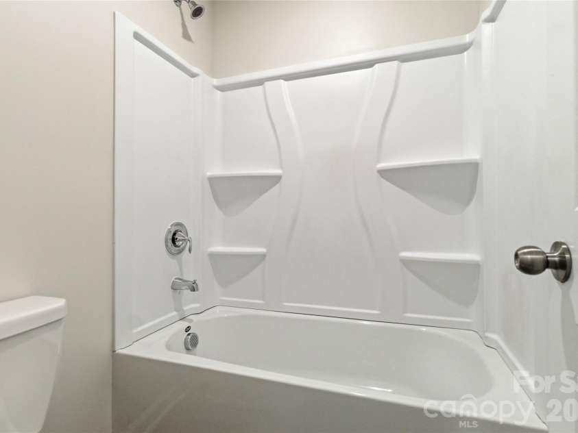 2801 Oldfield Drive, Monroe, NC 28110.  MLS# CAR4361095, YatesRealty ID 23147. Upper Level Bathroom