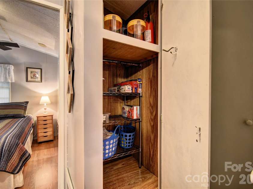 91 Mallard Loop, Waynesville, NC 28785.  MLS# CAR4372848, YatesRealty ID 23150. 2 Storage closets off the hallway